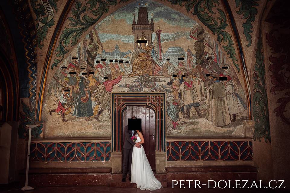 posed portraits of bride and groom in big vestibule