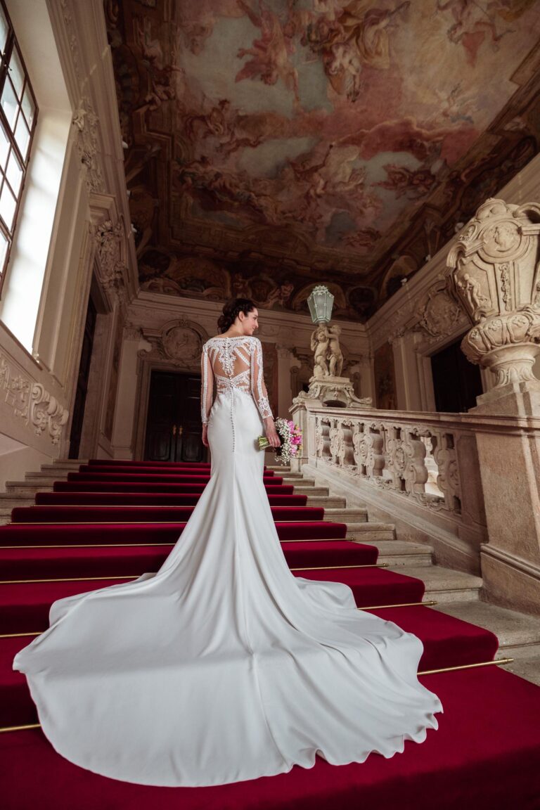 The bride on the staircase in Prague's Clam-Gallas Palace